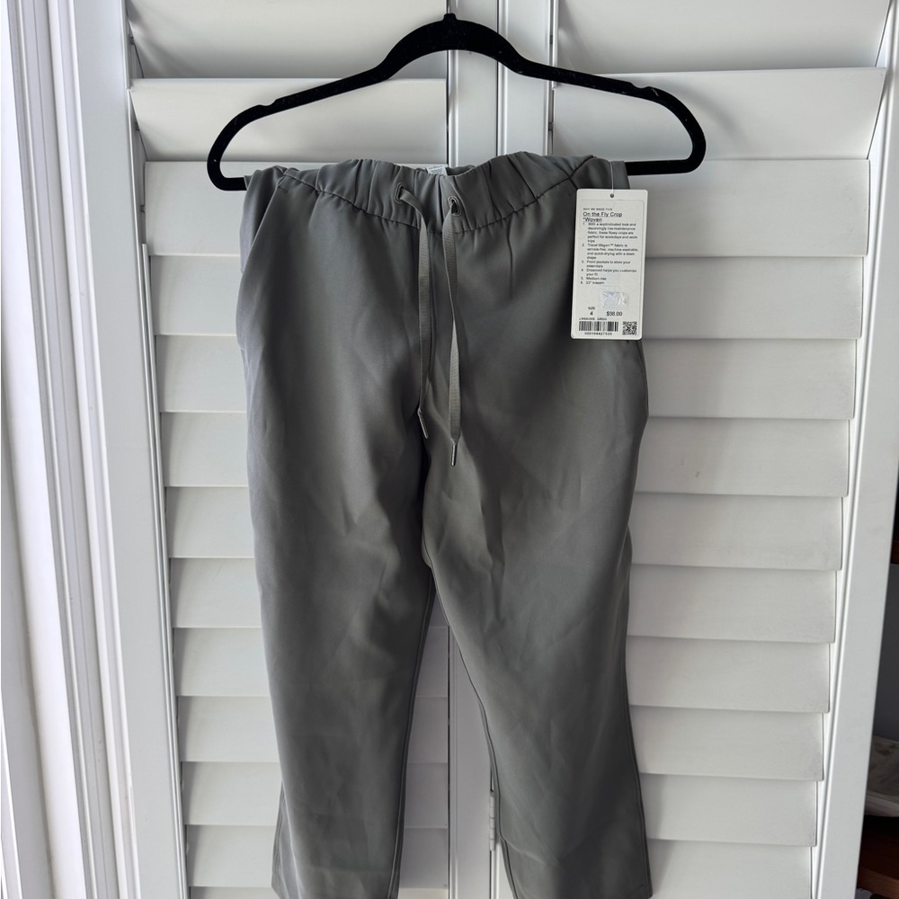 Lululemon On the Fly Crop Woven Green Gray Athletic Drawstring Pants Size 4 NWT